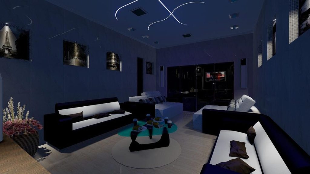 Inrichting van een home cinema met televisie, comfortabele zitplaatsen en sfeervol licht voor films kijken